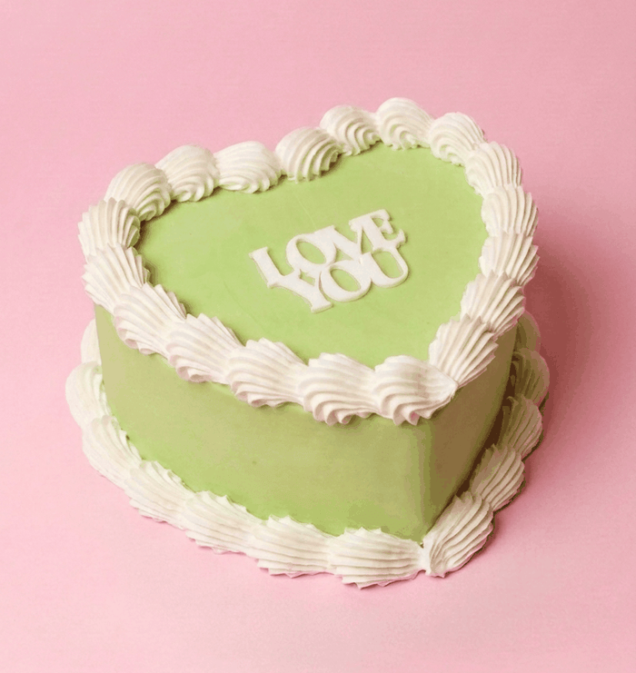 Green Pistachio Papi Cake with pistachio cream filling and green buttercream frosting available for Sydney cake delivery by Bloom Drop