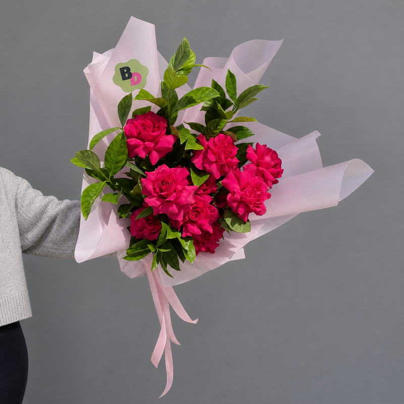 Reflexed roses wrapped bouquet with premium wrapping by Bloom Drop Sydney florist`

