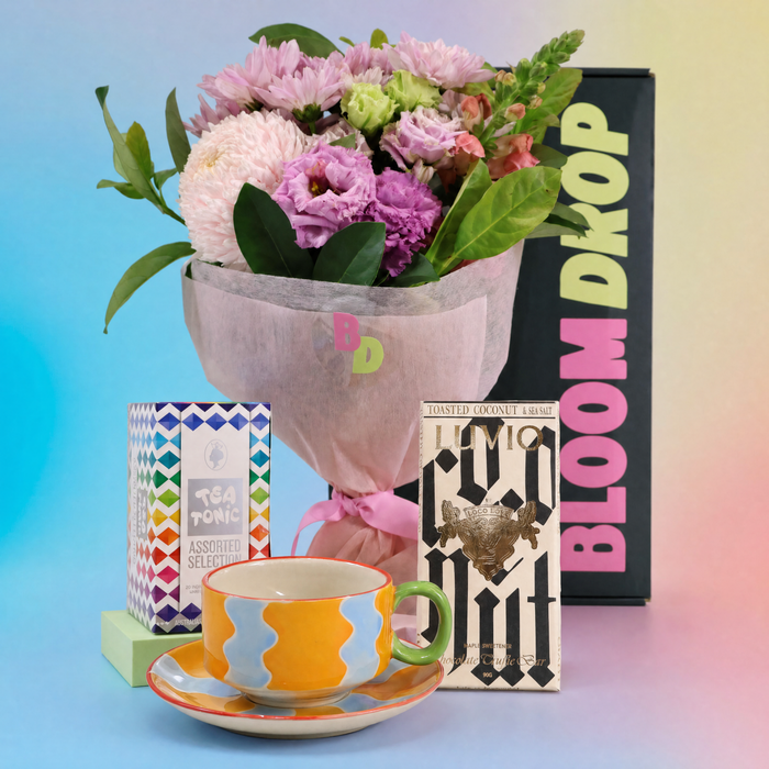Sympathy gift hamper Sydney with flowers, tea, chocolate and cup and saucer